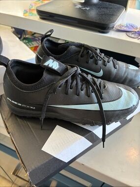 Nike boys Black Running/Cleat Sneakers with Light Blue Swoosh size 3Y